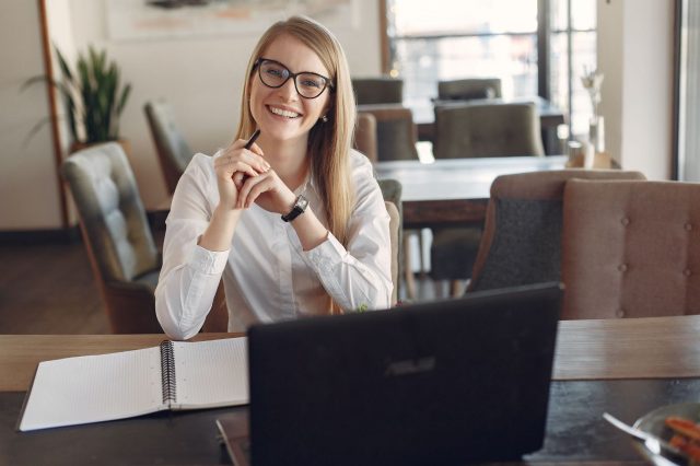 Smiling teacher conducting interview