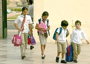 Four students coming in to school
