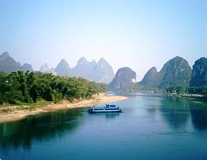 large-boat-on-water-with-hills