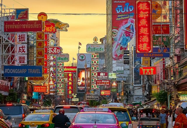 Bustling street filled with neon signs