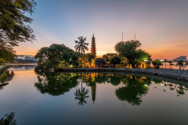 Historical Trần Quốc Pagoda along West Lake in Hanoi, representing teaching English in Vietnam.